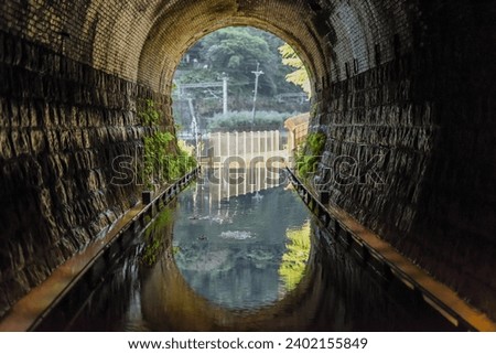 Beautiful Sandiaoling Eco-Friendly Train Tunnel With Water Reflection By Mudan River, Ruifang, Shuangxi, New Taipei City, Taiwan