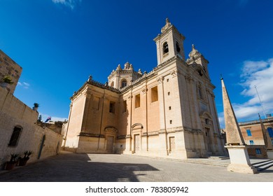 Beautiful sandstone sacral architecture cistyscape of Malta island. Beautiful landscape in south Europe.