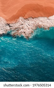 Beautiful Sandy Beach With Blue Sea, Vertical View. Drone View Of Tropical Blue Ocean Beach Nusa Penida Bali Indonesia. Lonely Sandy Beach With Beautiful Waves. Sandy Beach Wallpaper. Copy Space