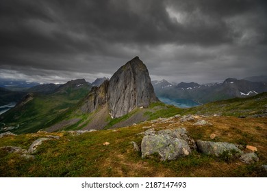 A beautiful scene of the amazing Segla mountain peak in Senja (Norway) with a dramatic gray sky