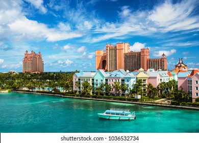 Beautiful scene boat  ocean  colorful houses   hotel in Nassau  Bahamas summer sunny day