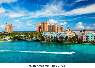 Beautiful scene speed boat  ocean  colorful houses   hotel in Nassau  Bahamas summer sunny day