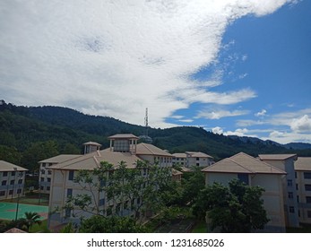 Beautiful and scenery crystal clear blue sky with white cloudy cloud and buildings from hills.