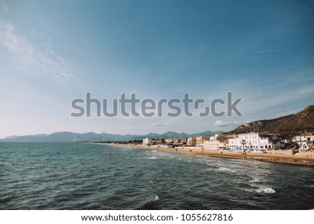 Similar – Evening view from above of the bay, the sandy beach and the old town of Sperlonga (southern Italy)