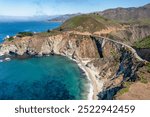 Beautiful scenery of Pacific Ocean coast along Highway 1 and Big Sur, wonderful aerial view of Bixby Bridge, sunset, sunrise, fog. Concept, travel, vacation, weekend.