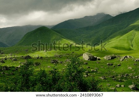 Beautiful scenic landscape of caucasus mountain's green hills and valleys