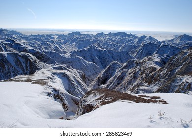 The Beautiful Scenic View Of Badlands Covered With Snow In November