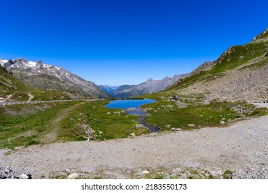 Beautiful scenic view of mountain panorama with mountain lake at Swiss mountain pass Susten on a sunny summer day. Photo taken July 13th, 2022, Susten Pass, Switzerland. - Shutterstock ID 2183550173
