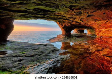 Beautiful sea cave sunset on Lake Superior near Munising, Michigan and Pictured Rocks National Lakeshore.