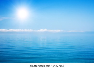 Beautiful sea and cloudy sky with sun