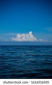 Beautiful Sea Horizon With Blue Sky And Clouds Close Up