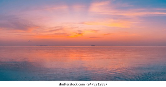 Beautiful sea ocean horizon. Skyscape seascape. Orange gold purple  sunset sky reflection calmness water surface, tranquil relaxing sunlight, summer mood. Inspirational nature view, wide horizon sky.  - Powered by Shutterstock