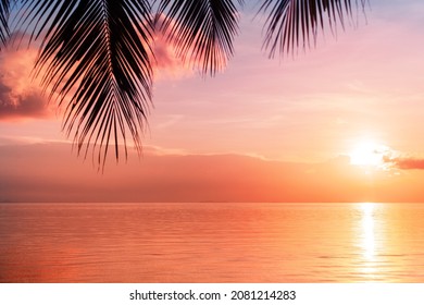Beautiful Sea Sunset, Morning Ocean Sunrise, Tropical Island Beach, Palm Tree Leaves Silhouette, Purple Sky, Orange Clouds, Yellow Sun Glow On Water, Dawn Landscape, Summer Holidays, Vacation, Travel