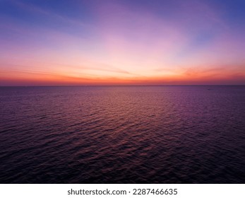 Beautiful Sea in sunset or sunrise light sky over sea in summer season,Image from drone camera,Amazing sea waves ocean sunset sky background	 - Shutterstock ID 2287466635