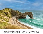 Beautiful sea view of Durdle Door, part of the Jurassic Coast, Dorset UK, one of the most photographed and iconic landmarks. 