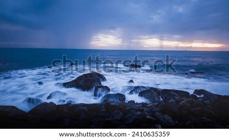 beautiful sea view with water going through the rocks. Long exposure photography with motion blur and slow shutter speed. seascape view.