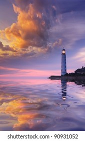 Beautiful seascape with a lighthouse at sunset