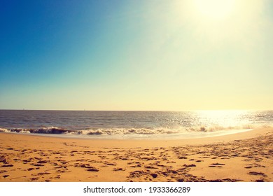 Beautiful Seascape With Sun, Sky, Ocean And Sand