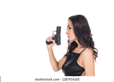 beautiful secret agent in black dress holding handgun, isolated on white