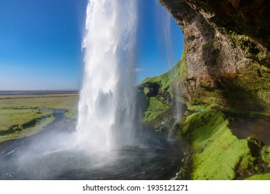 Beautiful Seljalandsfoss waterfall in Iceland, icelandic summer nature and river landscape
