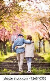 Beautiful Senior Couple In Love Outside In Spring Nature.