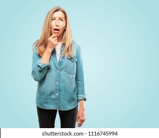 Beautiful Senior Woman With A Goofy, Dumb, Silly Look, Feeling Shocked And Confused At A Recent Realization, Not Really Understanding An Idea.