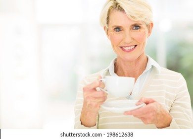 Beautiful Senior Woman Having Coffee