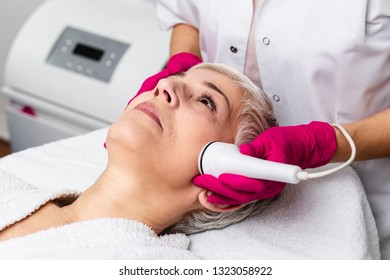 Beautiful Senior Woman Having Radio Waves Lifting Face Treatment.