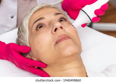 Beautiful Senior Woman Having Radio Waves Lifting Face Treatment.