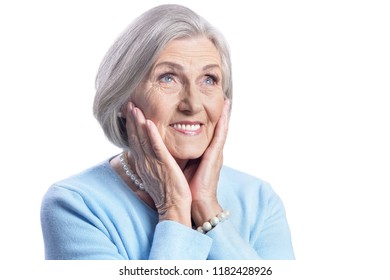 beautiful senior woman posing on white background - Shutterstock ID 1182428926