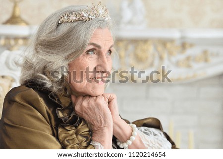 beautiful senior woman Queen