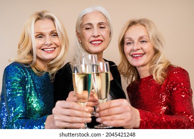 Beautiful Senior Women With Festive Elgant Dress Having Fun At A Party - Group Of Sexy Mature Ladies With Eccentric Fashionable Look Poising On Colored Backgrounds - Concepts About Elderly Lifestyle