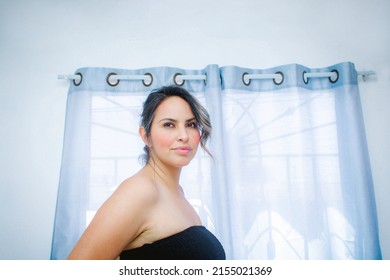 Beautiful And Sensual Middle Aged Mature Mexican Woman In Front Of Window