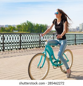 Beautiful Sensuality Elegance Haired Hair Woman Happy Fun Cheerful Smiling Blue Sunglasses Black T-shirt Jeans Bicycle Urban City Portrait Nature Slim Sport Body Hobby Equipment Riding Bike Cyclist 