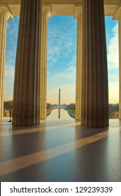 Beautiful Serene Dawn Reflects Washington Monument In The New Reflecting Pool. Framed By Pillars From The Lincoln Memorial. Washington, DC