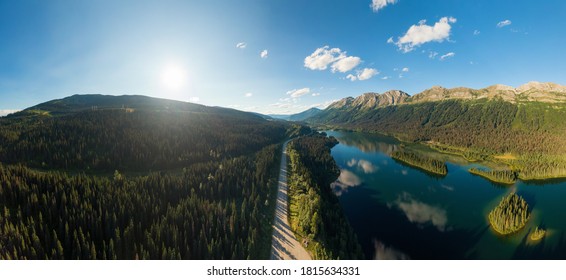 Beautiful, Serene Panoramic Road View With Mountains, Islands And Lakes On A Sunny Summer Day. Aerial Shot Near Pine Le Moray, And Powder King Moutain. John-Hart Highway, British Columbia.