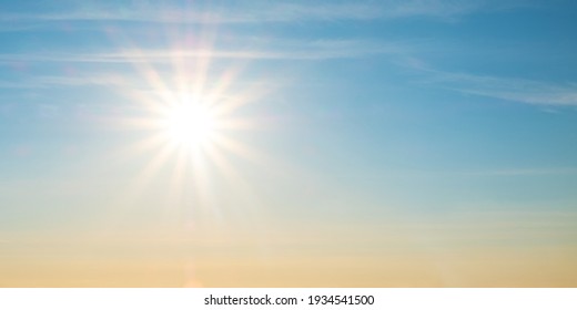 beautiful setting sun and blue sky with copy space. - Shutterstock ID 1934541500