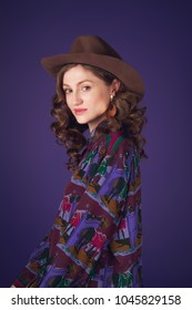 Beautiful Sexy Classy Woman Model In Cowgirl Shirt And Cowboy Hat Full Body Portrait Blue Background Studio Natural Caucasian Makeup Attitude Glasses