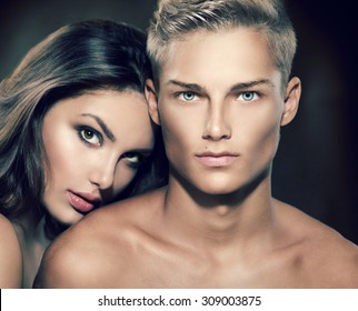 Beautiful Sexy Couple Portrait. Model Man With His Girlfriend Posing Together. Passion. Boy And Girl In Love