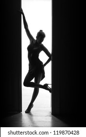 Beautiful, Sexy Dancer Woman Stands In Doorway, Silhouette