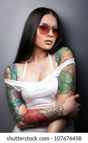 Beautiful sexy glamorous girl with tattoos.tattoo
