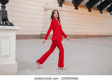 Beautiful Sexy Rich Business Style Woman In Red Suit Walking In City Street, Spring Summer Fashion Trend