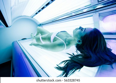 Beautiful Sexy Woman Tanning In Solarium