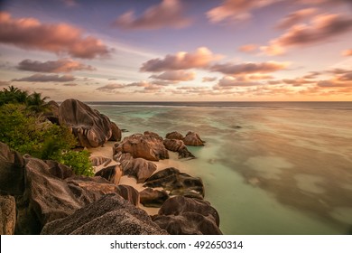 Beautiful Seychelles tropical beach Anse Source D Argent at La Digue island in sunset