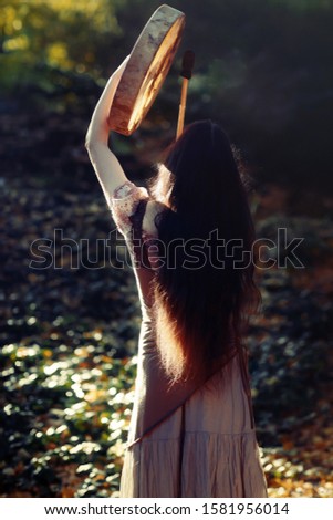 Similar – Image, Stock Photo Cool blonde woman performing dancing at sunset and raising the hand close to her head