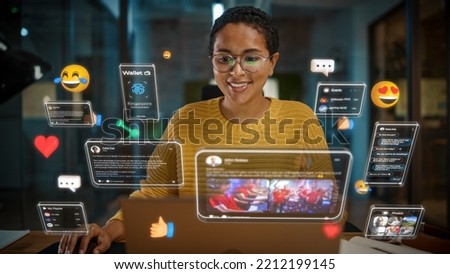 Beautiful Short Haired Project Manager Working on Computer in Office. Augmented Reality Social Media Icons Appear From Worker's Laptop. Internet of Things, Connectivity and Online Concept.