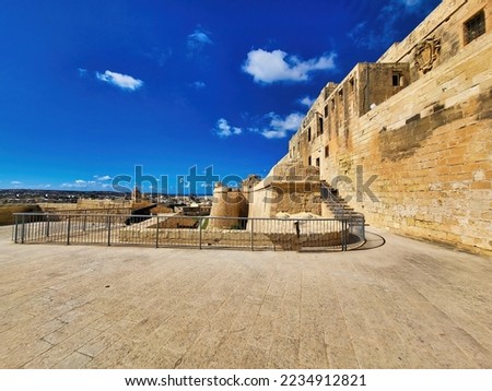 A beautiful shot of a castle and the sea form the beach. Patara old  patara ancient city holÄ±day. Street with an old stone abandoned building. Panoramic image, space for your text