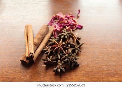 A beautiful shot of cinnamon clove, star anise, and rose petals - Powered by Shutterstock