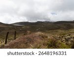 Beautiful shot of Colombian Sumapaz paramo ecosystem with rocky mountains beautiful small lakes in cloudy day