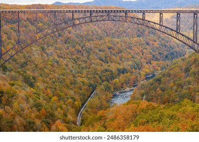 A beautiful shot of a colorful autumn landscape with a bridge in New River Gorge National Park - Powered by Shutterstock